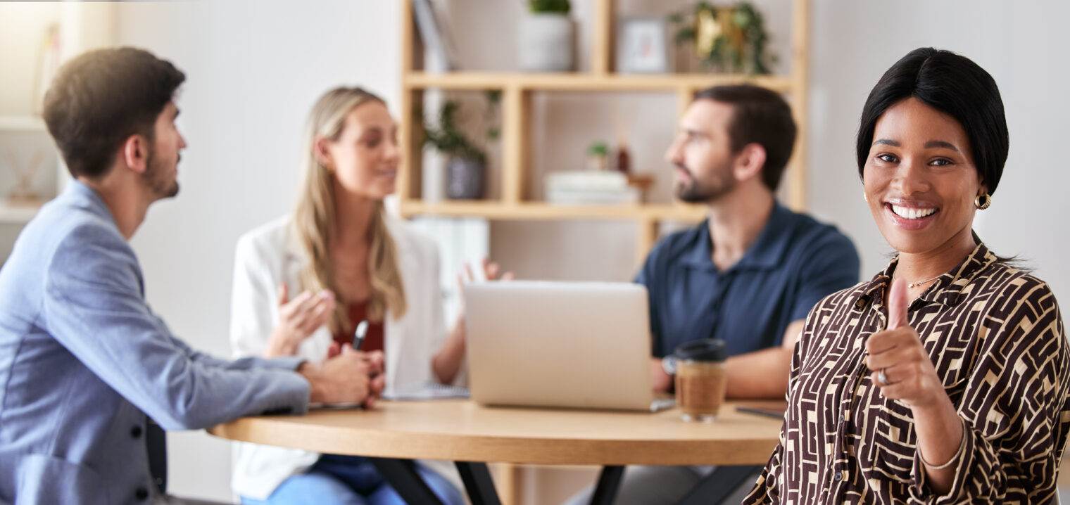 Thumbs up, thank you and business woman in company success meeting happy about startup growth. Port.